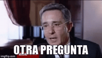 Man In Suit Holding Banana GIF