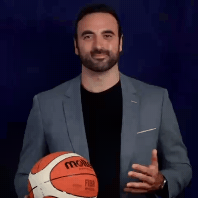 Man In Suit Holding Basketball GIF