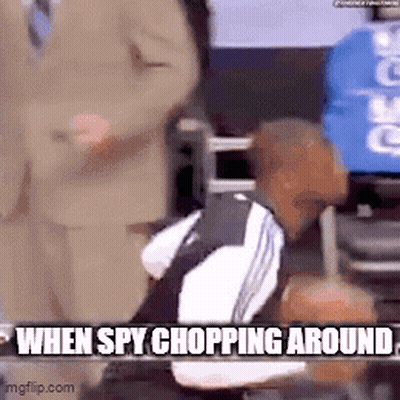 Man In Suit Holding Basketball Says When Spy Chopping Around GIF
