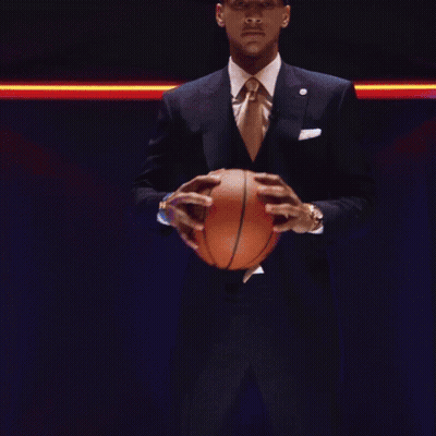 Man In Suit Holding Basketball GIF