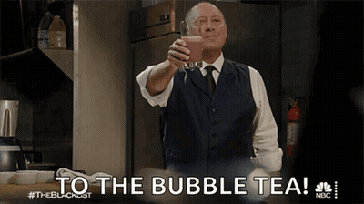 Man In Suit Holding Bubble Tea Saying To The Bubble Tea GIF