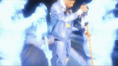 Man In Suit Holding Cane GIF