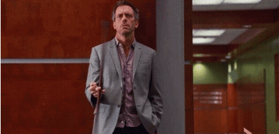 Man In Suit Holding Cane GIF
