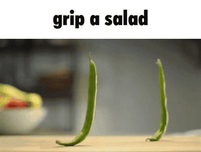 Man In Suit Holding Cards Saying I Got A Grip GIF