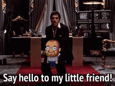 Man In Suit Holding Cartoon Character Say Hello GIF
