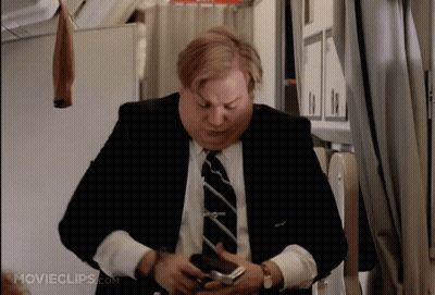 Man In Suit Holding Cell Phone Movieclips Logo GIF