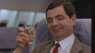 Man In Suit Holding Champagne GIF