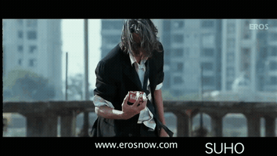 Man In Suit Holding Coca Cola Can GIF