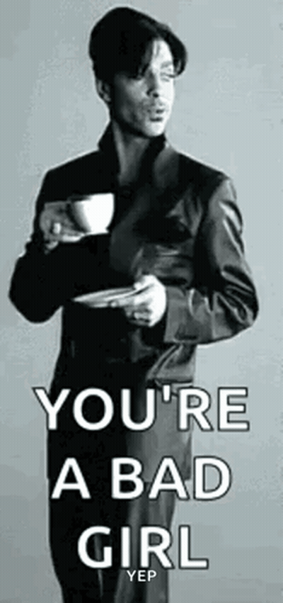Man In Suit Holding Coffee And Plate GIF