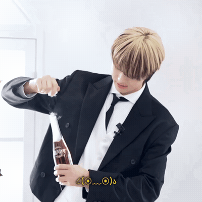 Man In Suit Holding Coke GIF