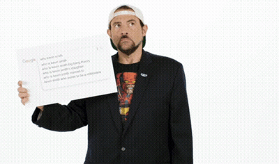 Man In Suit Holding Did I Win Paper GIF
