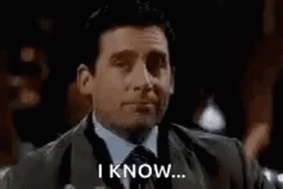 Man In Suit Holding Drink Saying I Know GIF