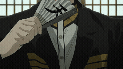 Man In Suit Holding Fan GIF