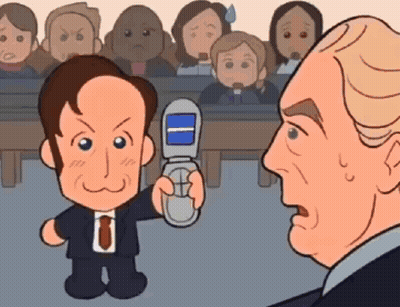 Man In Suit Holding Flip Phone GIF