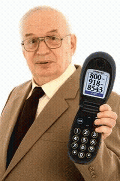 Man In Suit Holding Flip Phone With 800-918-8543 On Screen GIF