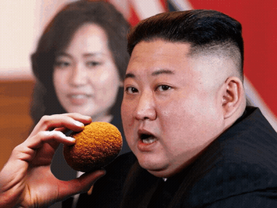 Man In Suit Holding Fried Food GIF