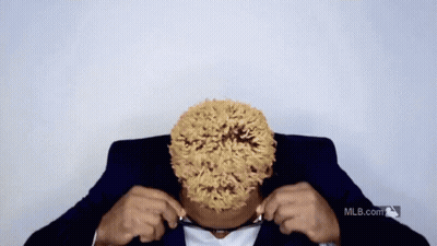 Man In Suit Holding Glasses GIF