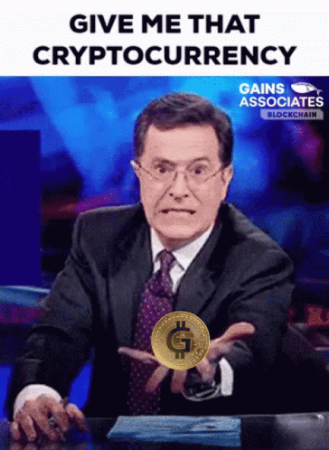 Man In Suit Holding Gold Coin With G GIF