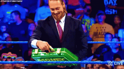 Man In Suit Holding Green Box Saying Smackdown GIF