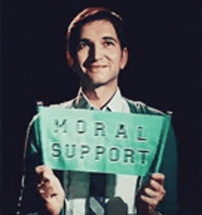 Man In Suit Holding Green Sign Moral Support GIF