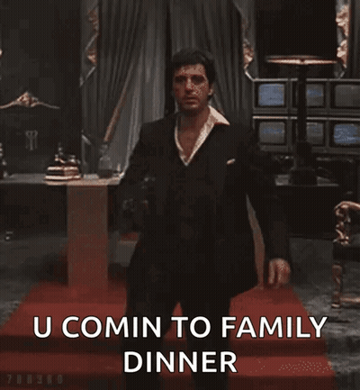 Man In Suit Holding Gun GIF