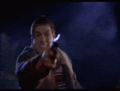 Man In Suit Holding Gun And Screaming GIF