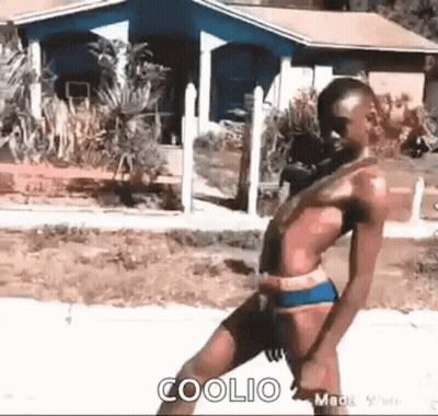 Man In Suit Holding Gun GIF