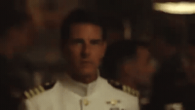 Man In Suit Holding Gun Saying Happy Bday GIF