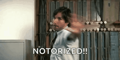 Man In Suit Holding Gun Saying Notorized GIF