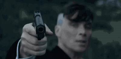 Man In Suit Holding Gun To Forehead GIF