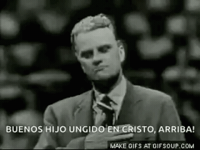 Man In Suit Holding Hand To Chest GIF