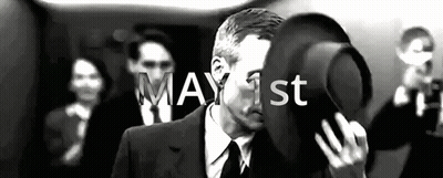 Man In Suit Holding Hat GIF