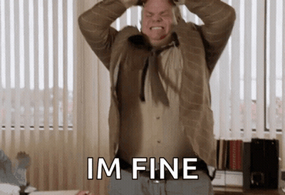Man In Suit Holding Head Says Im Fine GIF