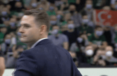 Man In Suit Holding IG Sign GIF
