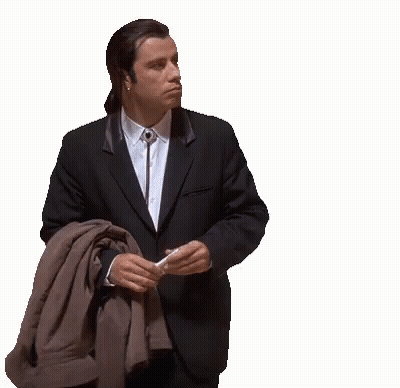 Man In Suit Holding Jacket Over Shoulder GIF