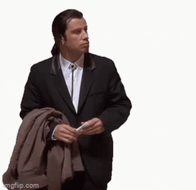 Man In Suit Holding Jacket Over Shoulder GIF