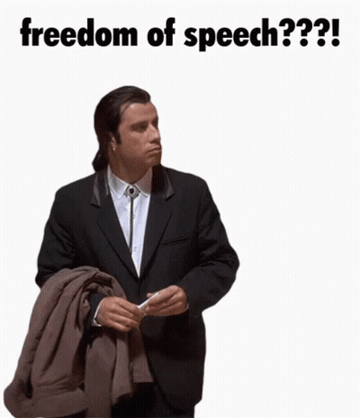 Man In Suit Holding Jacket Saying Freedom Of Speech GIF