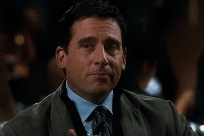 Man In Suit Holding Martini GIF