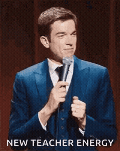 Man In Suit Holding Microphone GIF