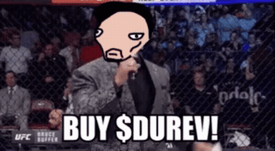 Man In Suit Holding Microphone Saying Buy Durev GIF