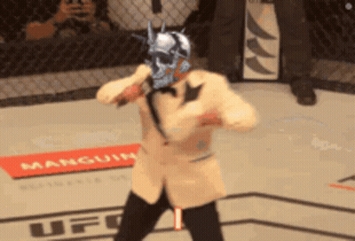 Man In Suit Holding Microphone Saying Its Timeeee GIF