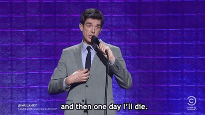 Man In Suit Holding Microphone Saying One Day I Will Die GIF