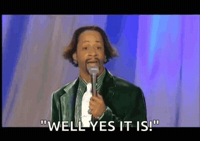 Man In Suit Holding Microphone Saying Well Yes It Is GIF