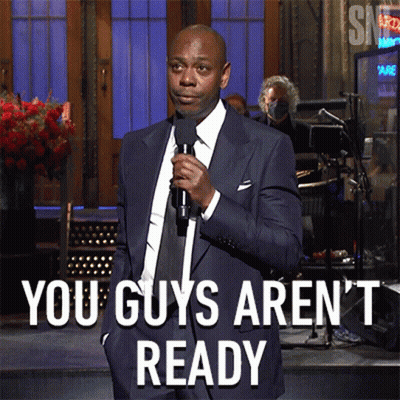 Man In Suit Holding Microphone Says You Guys Arent Ready GIF