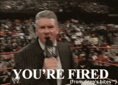 Man In Suit Holding Microphone Says You Re Fired GIF