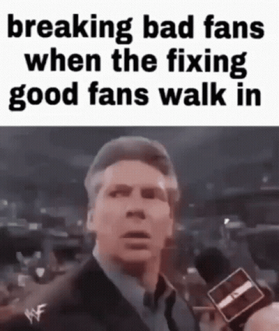 Man In Suit Holding Microphone GIF