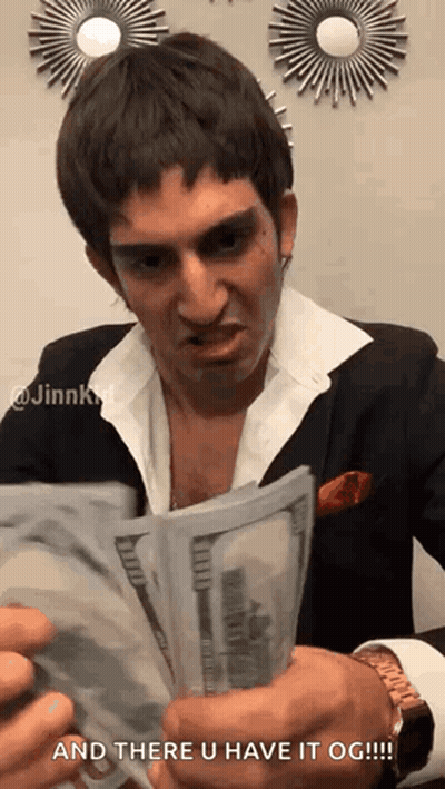 Man In Suit Holding Money GIF