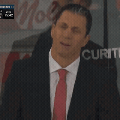Man In Suit Holding Paper At Securit Screen GIF