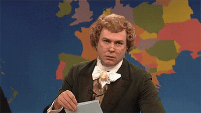 Man In Suit Holding Paper In Front Of World Map GIF