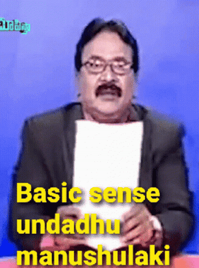 Man In Suit Holding Paper Saying Basic Sense Undadhu Manushulaki GIF